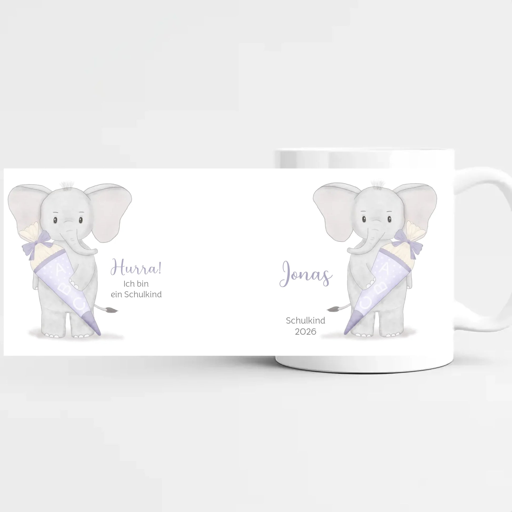 Tasse zur Einschulung, Elefant mit Schultüte Tasse (Keramik) weiss bedruckt Höhe: 9,5 cm, Durchmesser: 8 cm, Volumen: 325 ml